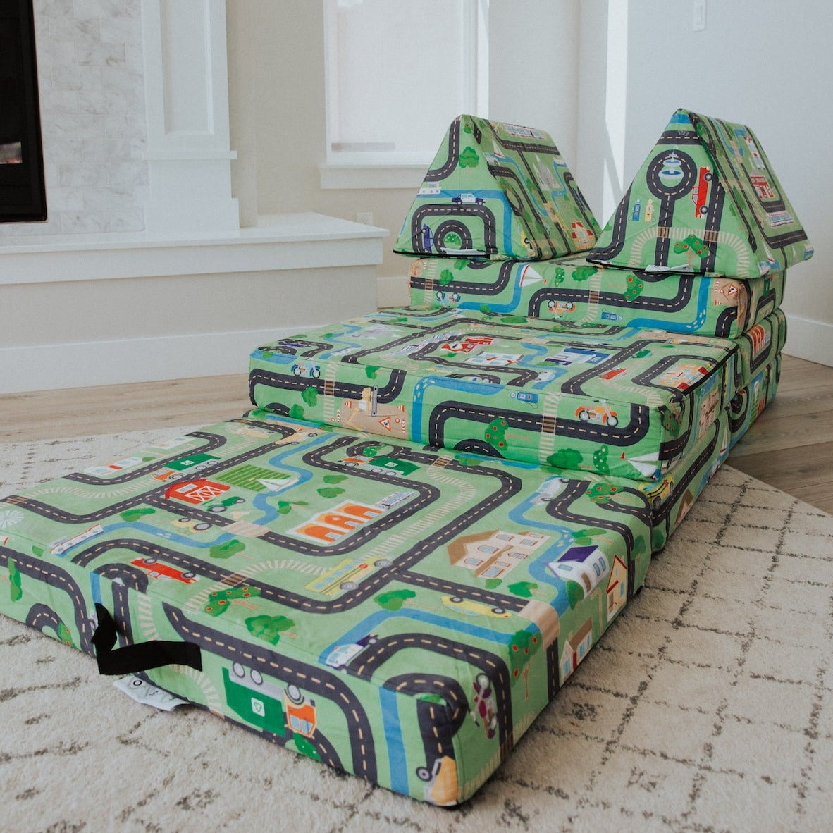Kids Play Couch by Leo Mat, featuring a roads and vehicles pattern, displayed on a mat.