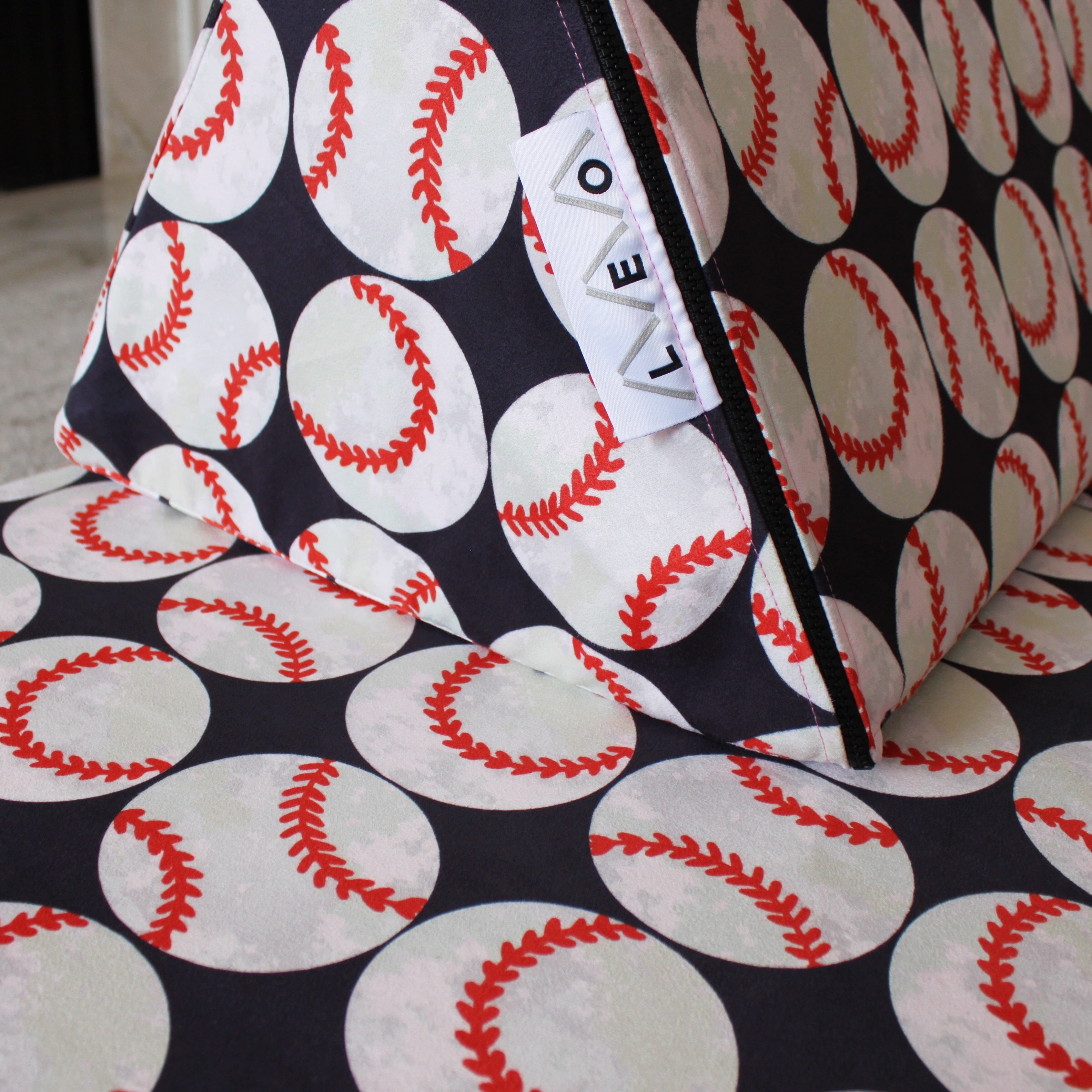 Fabric with baseball pattern on a black background