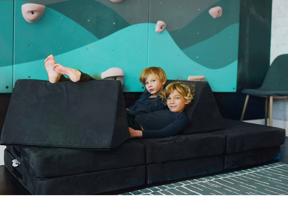 The Midnight Black LeoMat™ is a foldable play mat for kids of all ages