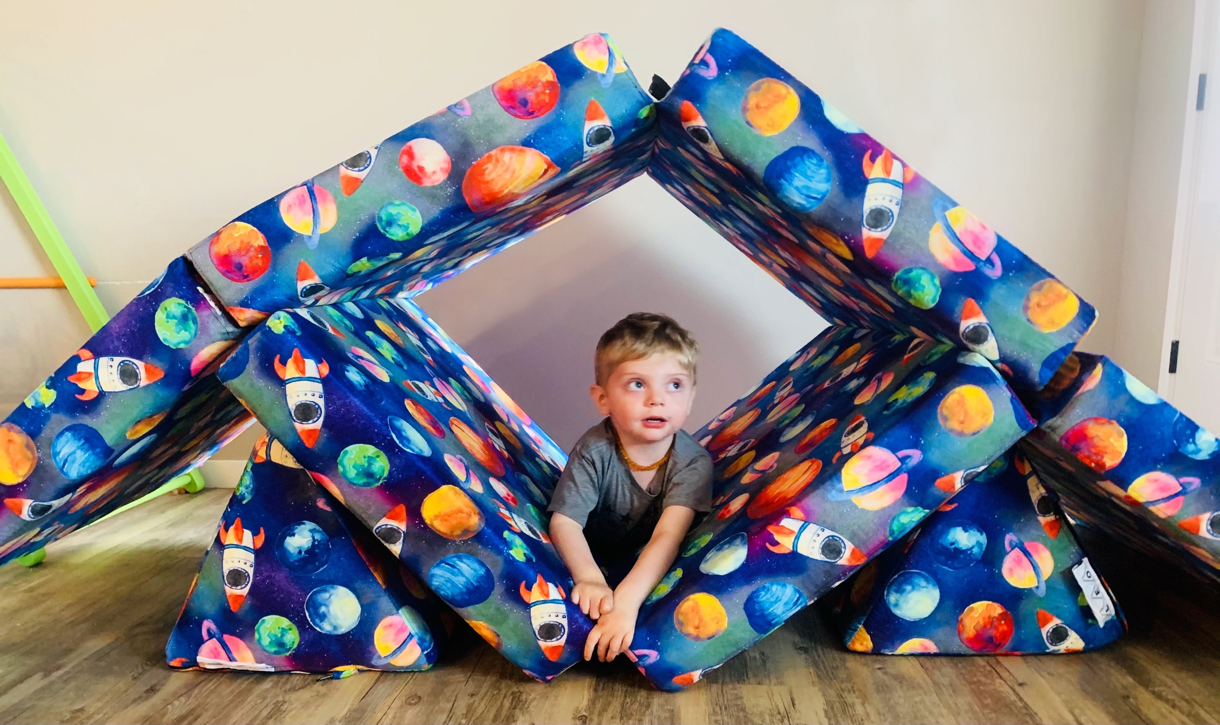 The Lunar Space LeoMat™ is a foldable play mat for kids of all ages